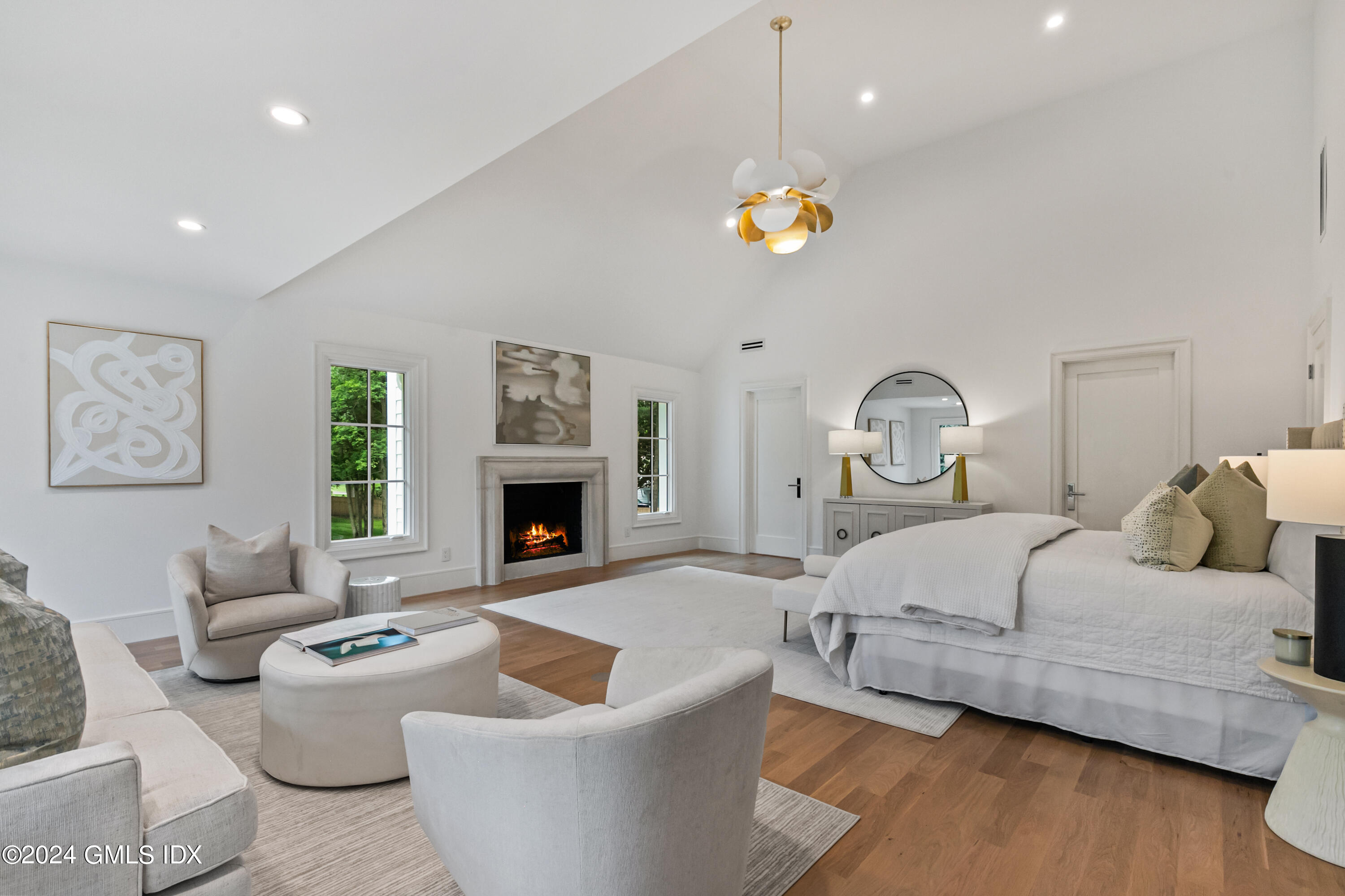 248 Round Hill Road Greenwich, CT 06831 - Photo 17 of 49 a bedroom with furniture and a fireplace