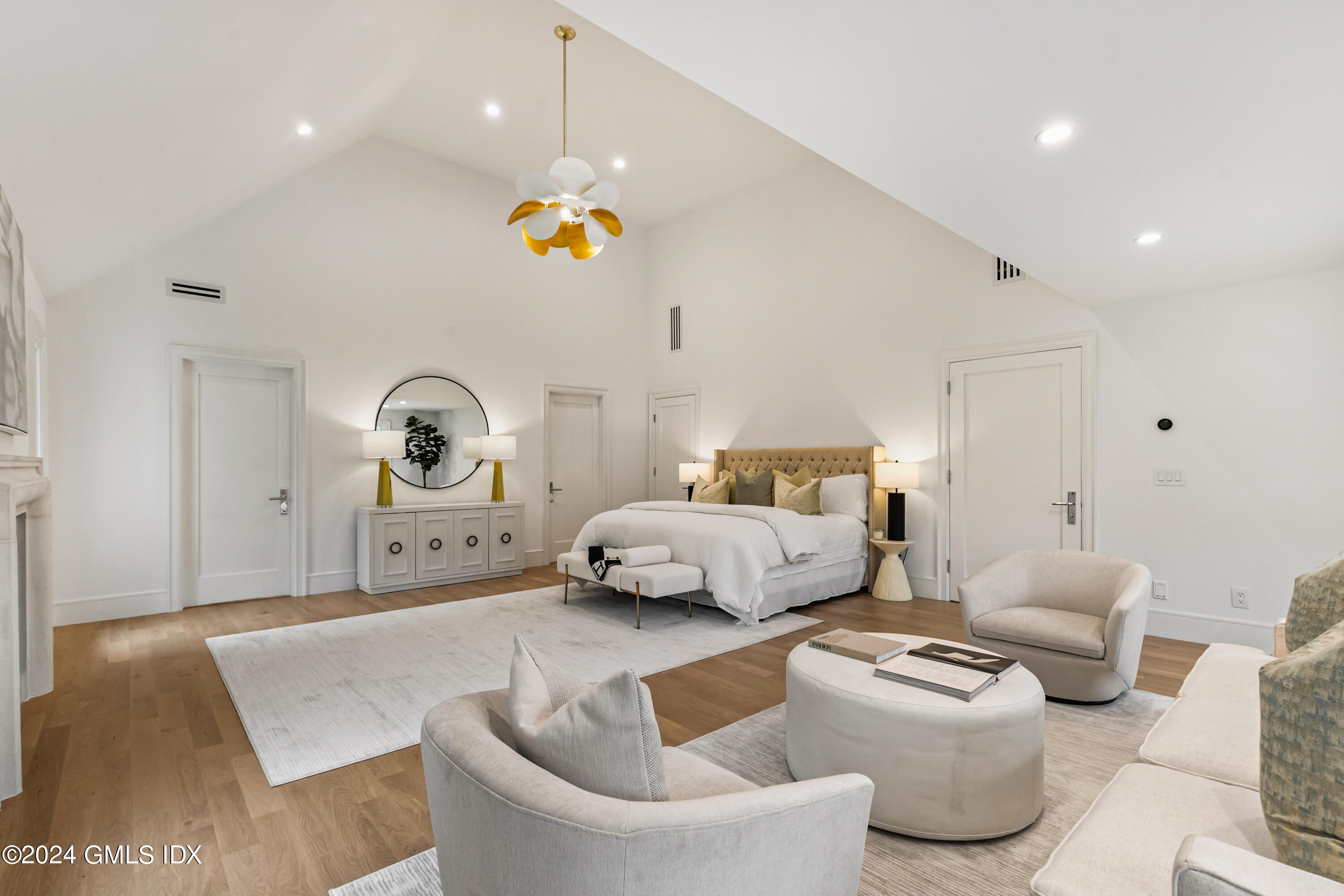 248 Round Hill Road Greenwich, CT 06831 - Photo 18 of 49 a bedroom with furniture and a couch