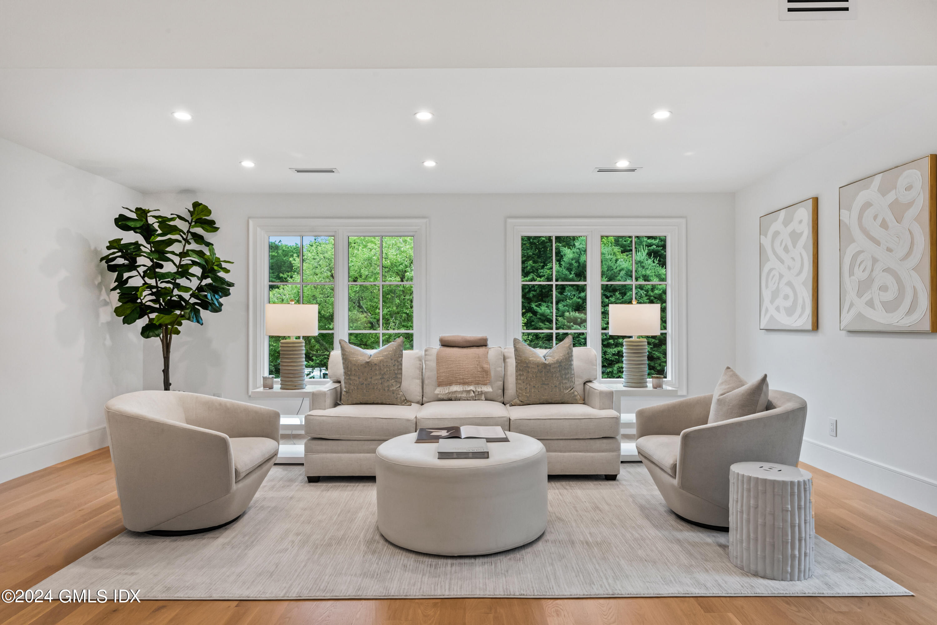 248 Round Hill Road Greenwich, CT 06831 - Photo 21 of 49 a living room with furniture and a large window
