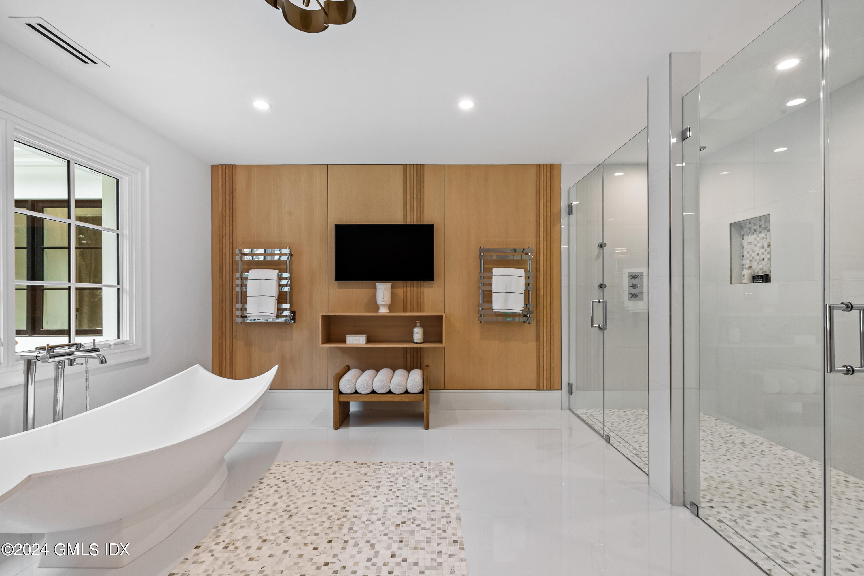 248 Round Hill Road Greenwich, CT 06831 - Photo 23 of 49 a living room with furniture and a flat screen tv