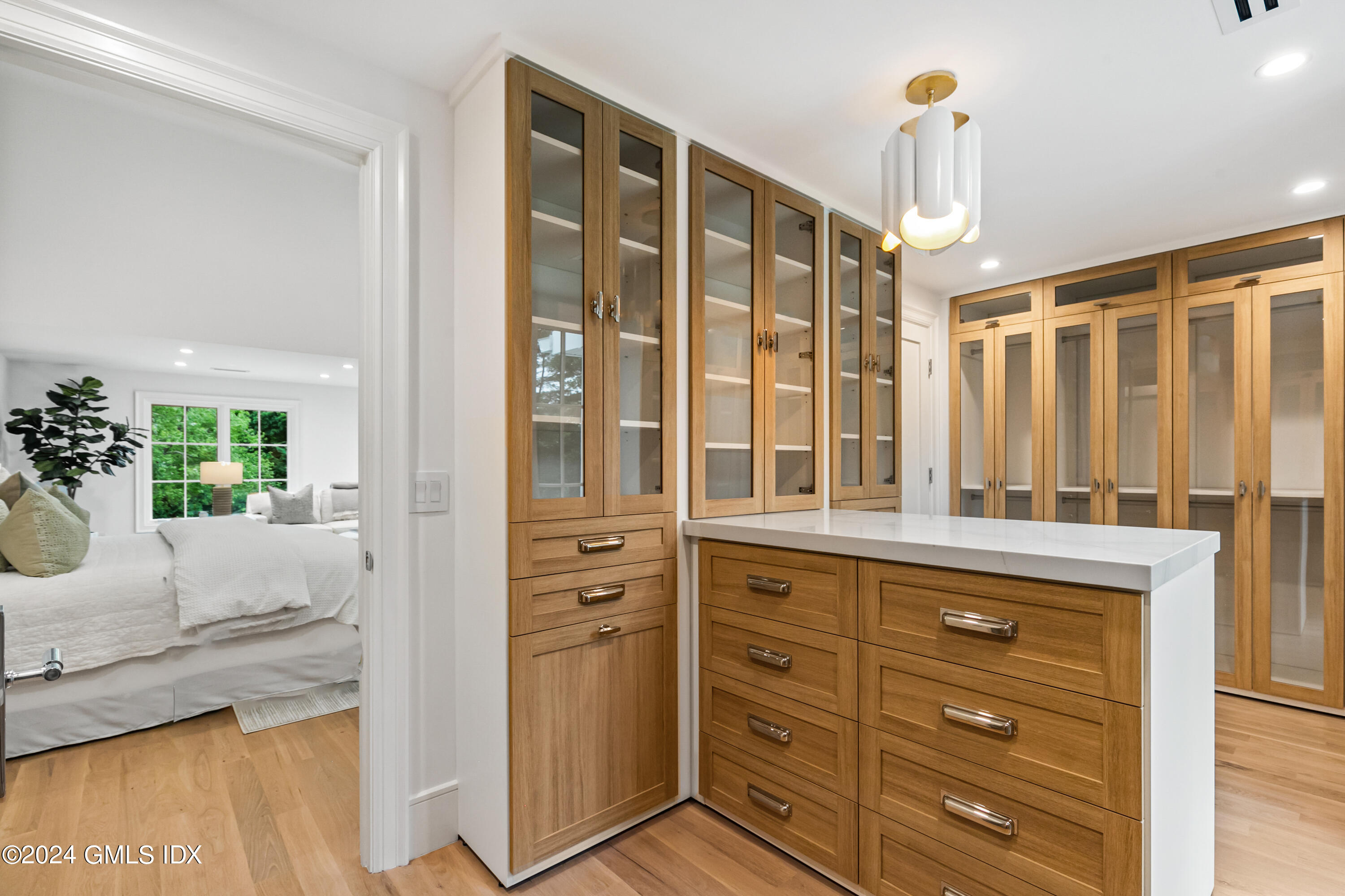 248 Round Hill Road Greenwich, CT 06831 - Photo 25 of 49 a bathroom with a granite countertop sink mirror and shower
