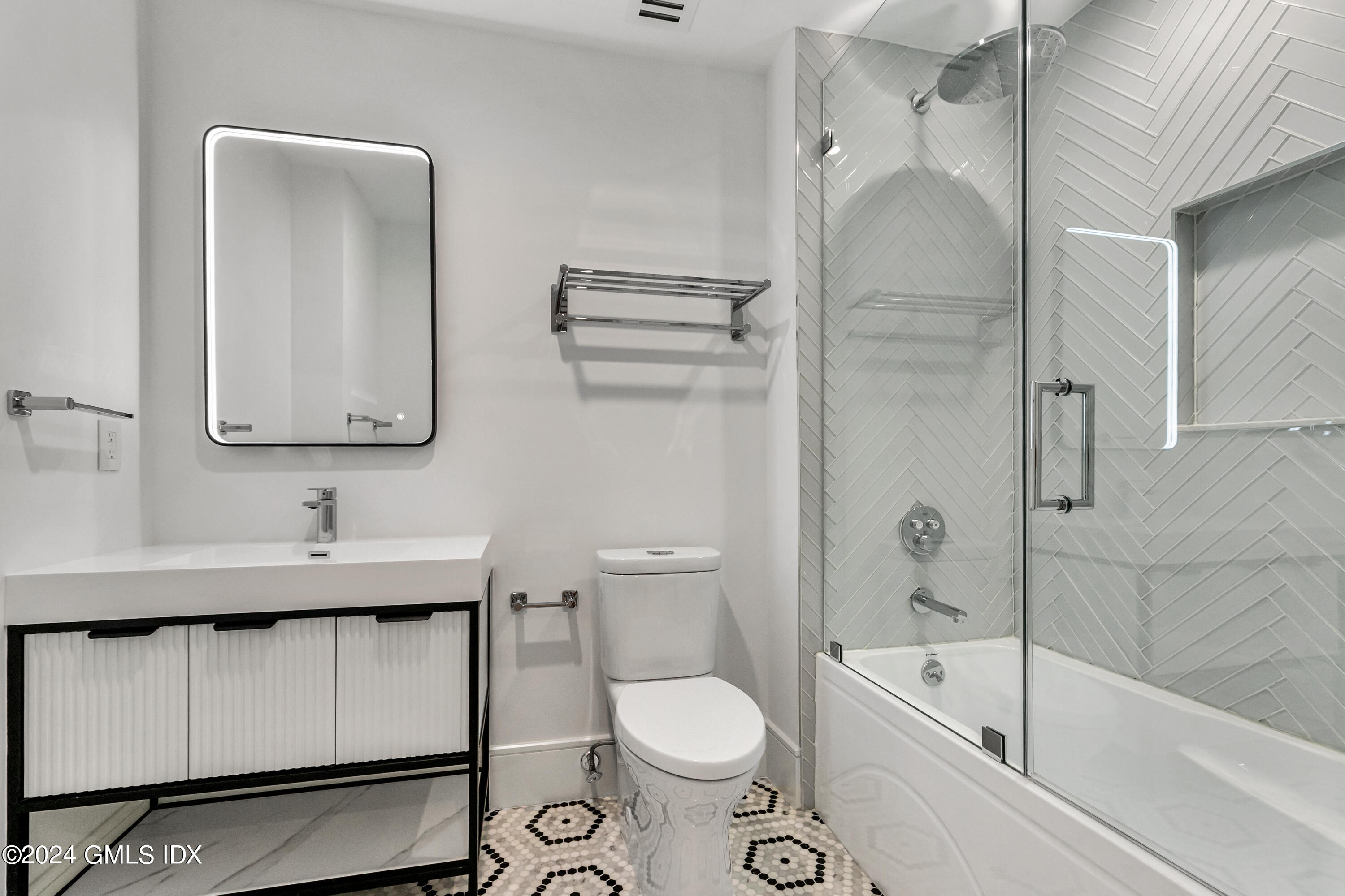 248 Round Hill Road Greenwich, CT 06831 - Photo 31 of 49 a bathroom with a sink a toilet and shower