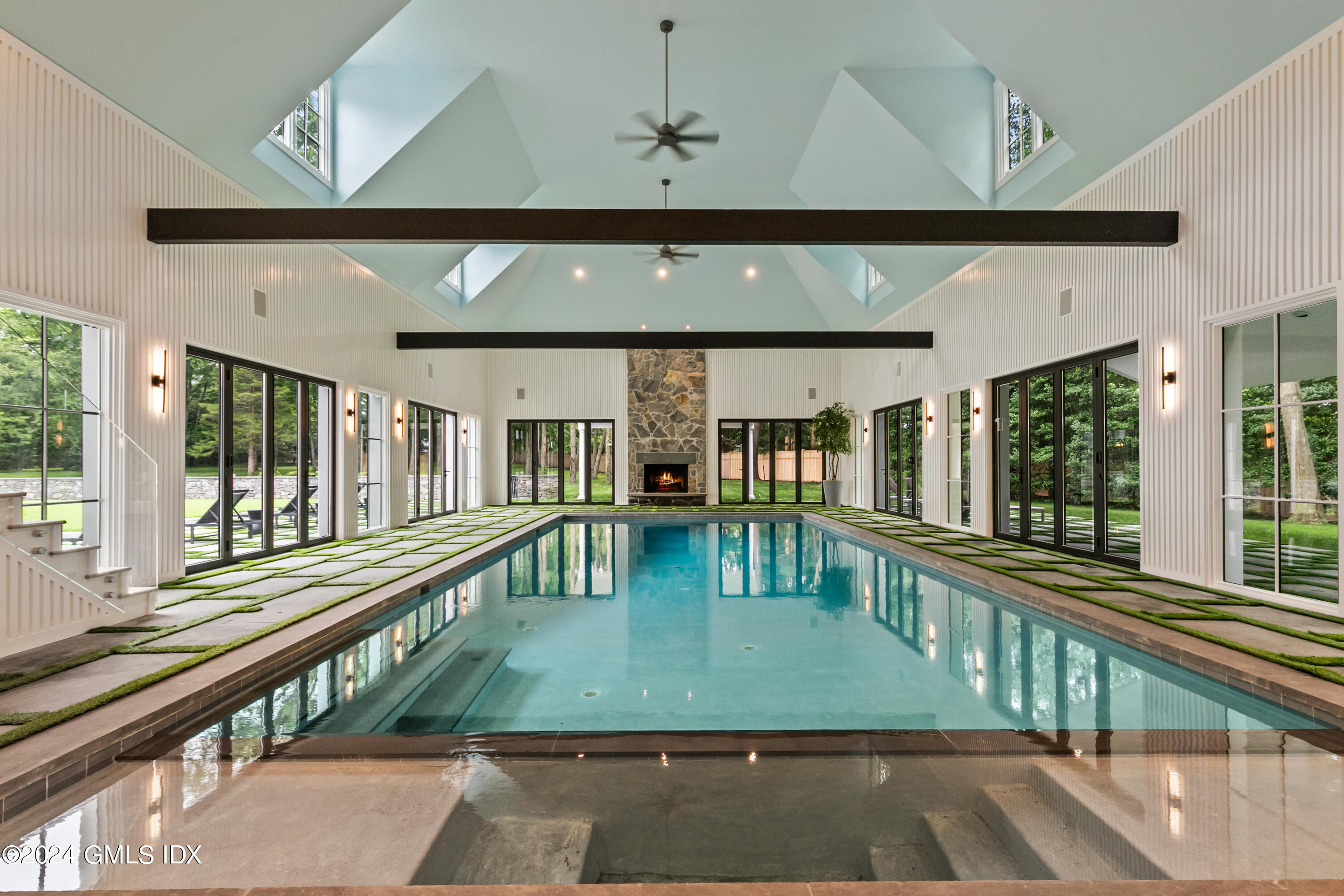 248 Round Hill Road Greenwich, CT 06831 - Photo 33 of 49 a view of a porch with furniture and deck