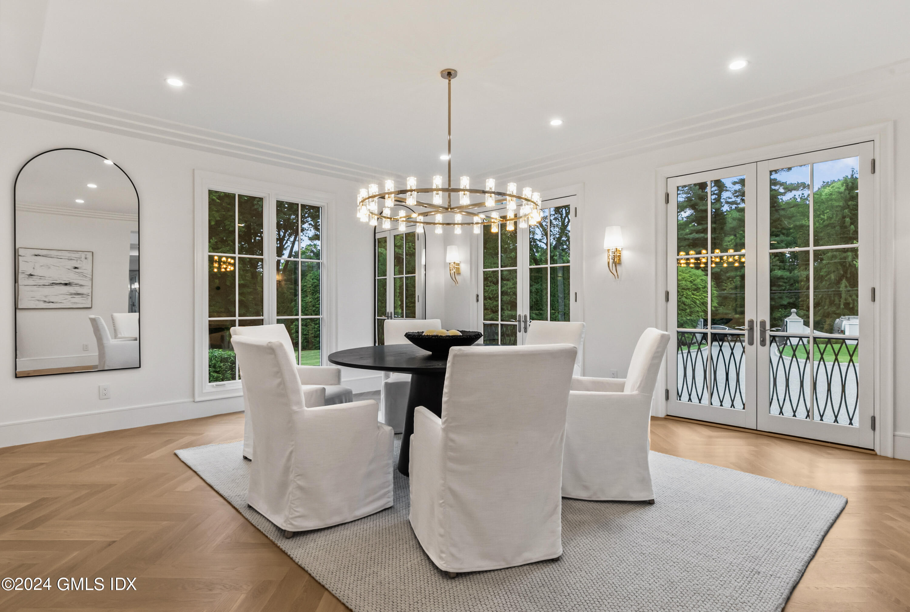 248 Round Hill Road Greenwich, CT 06831 - Photo 9 of 49 a view of a dining room with furniture window and wooden floor