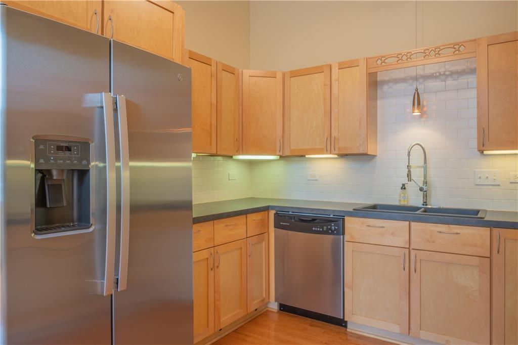 10 Walnut Street, Unit 6 Pittsburgh, PA 15202 - Photo 18 of 35 a kitchen with cabinets and stainless steel appliances