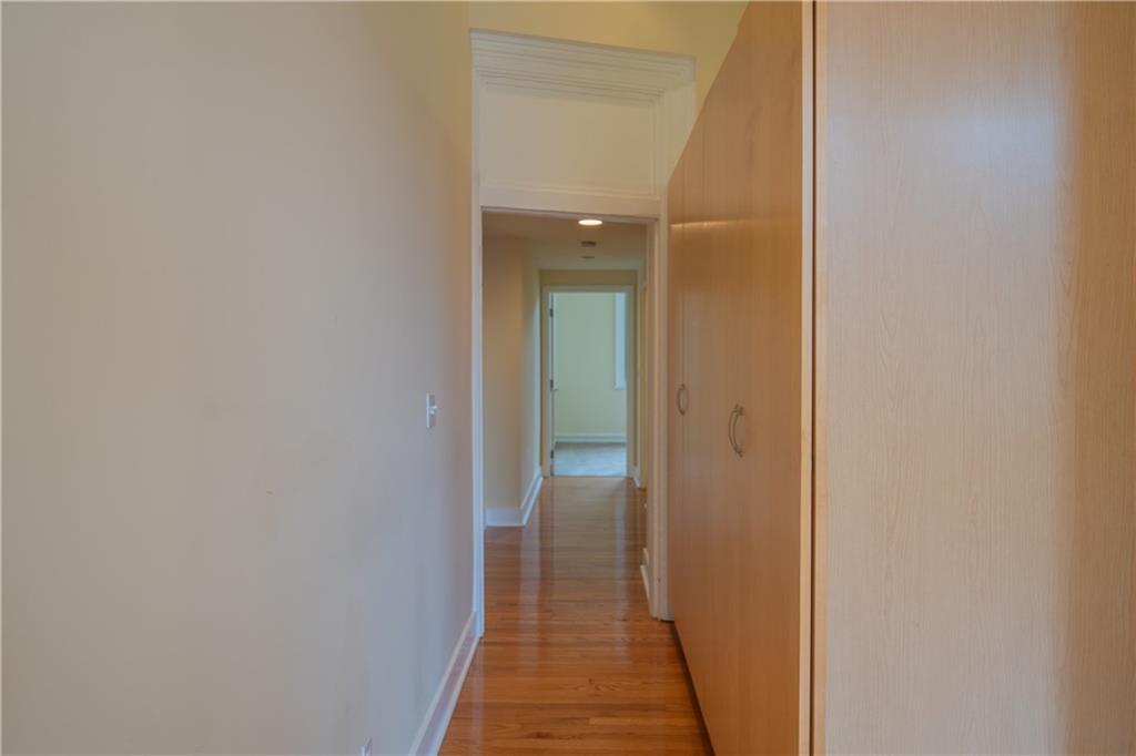 10 Walnut Street, Unit 6 Pittsburgh, PA 15202 - Photo 21 of 35 a view of a hallway with wooden floor