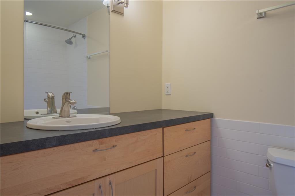 10 Walnut Street, Unit 6 Pittsburgh, PA 15202 - Photo 27 of 35 a bathroom with a sink and vanity