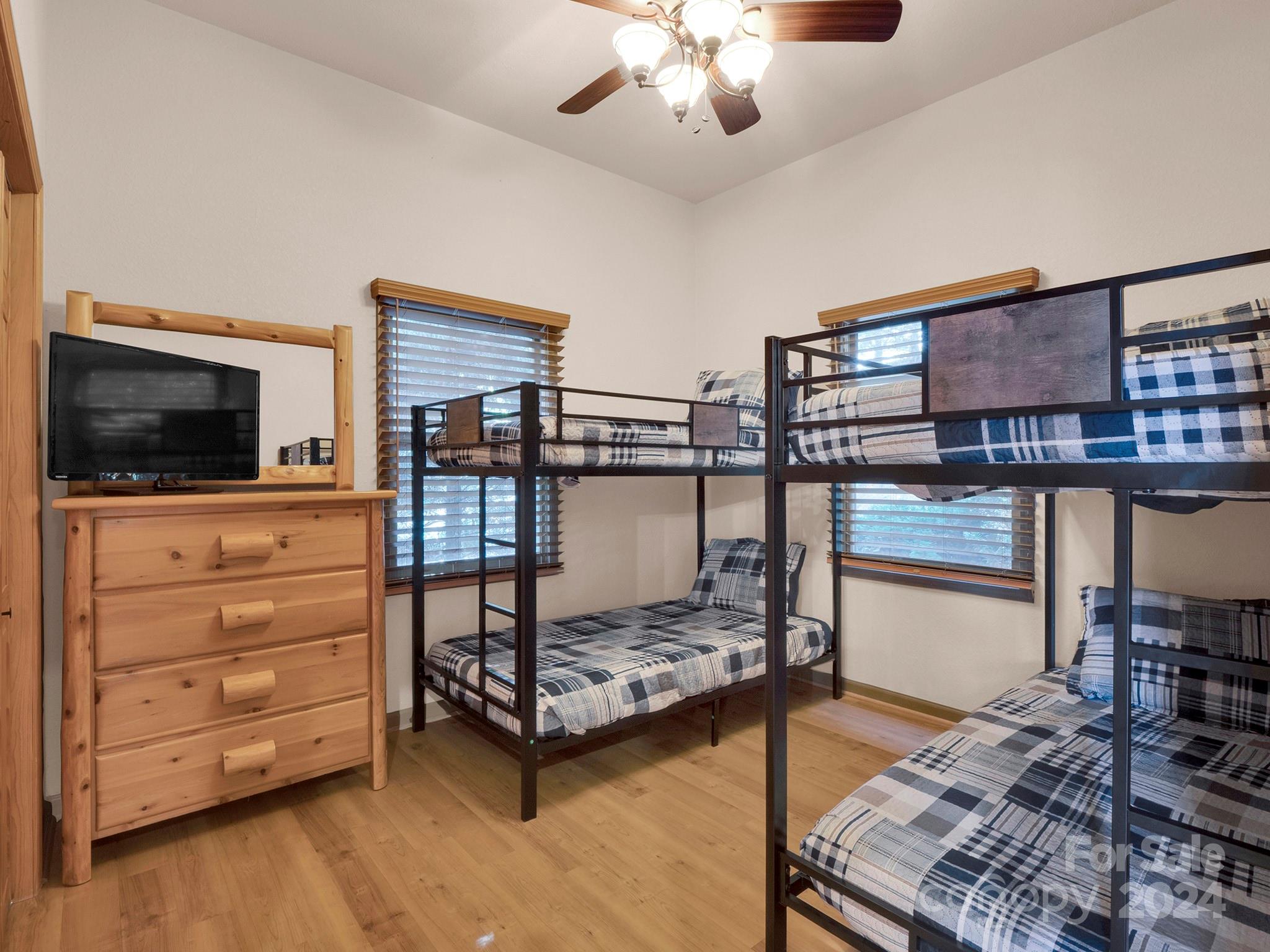 195 Grandview Mesa Road Whittier, NC 28789 - Photo 13 of 37 a living room with furniture and a flat screen tv