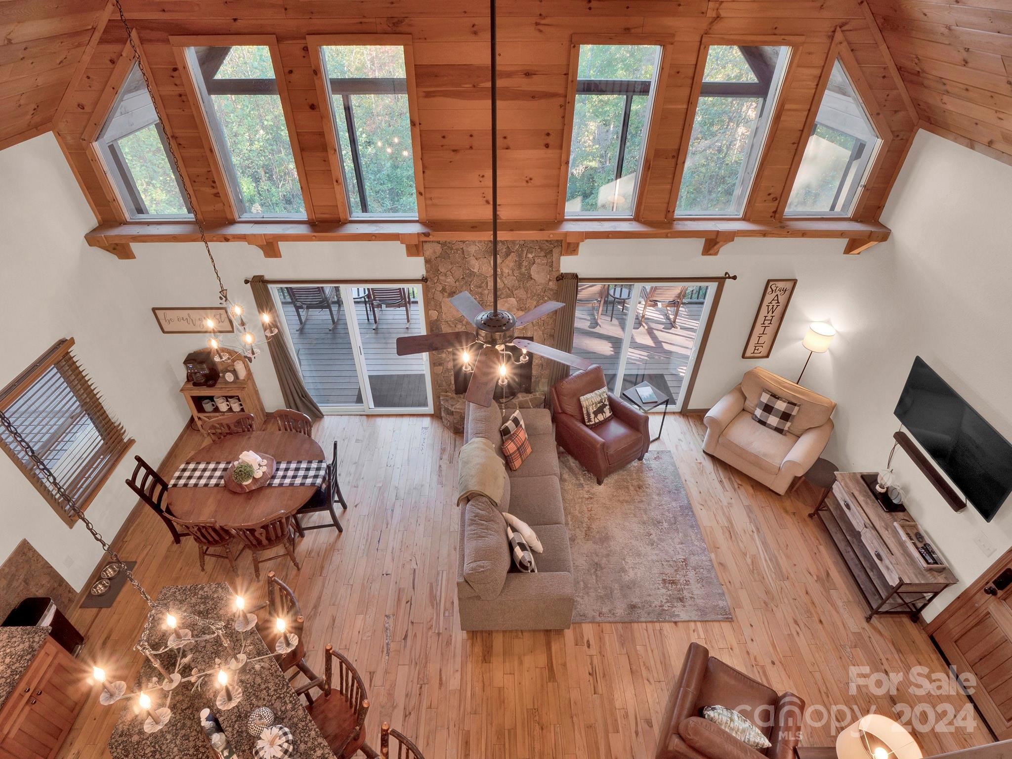 195 Grandview Mesa Road Whittier, NC 28789 - Photo 18 of 37 a view of living room with furniture and flat screen tv