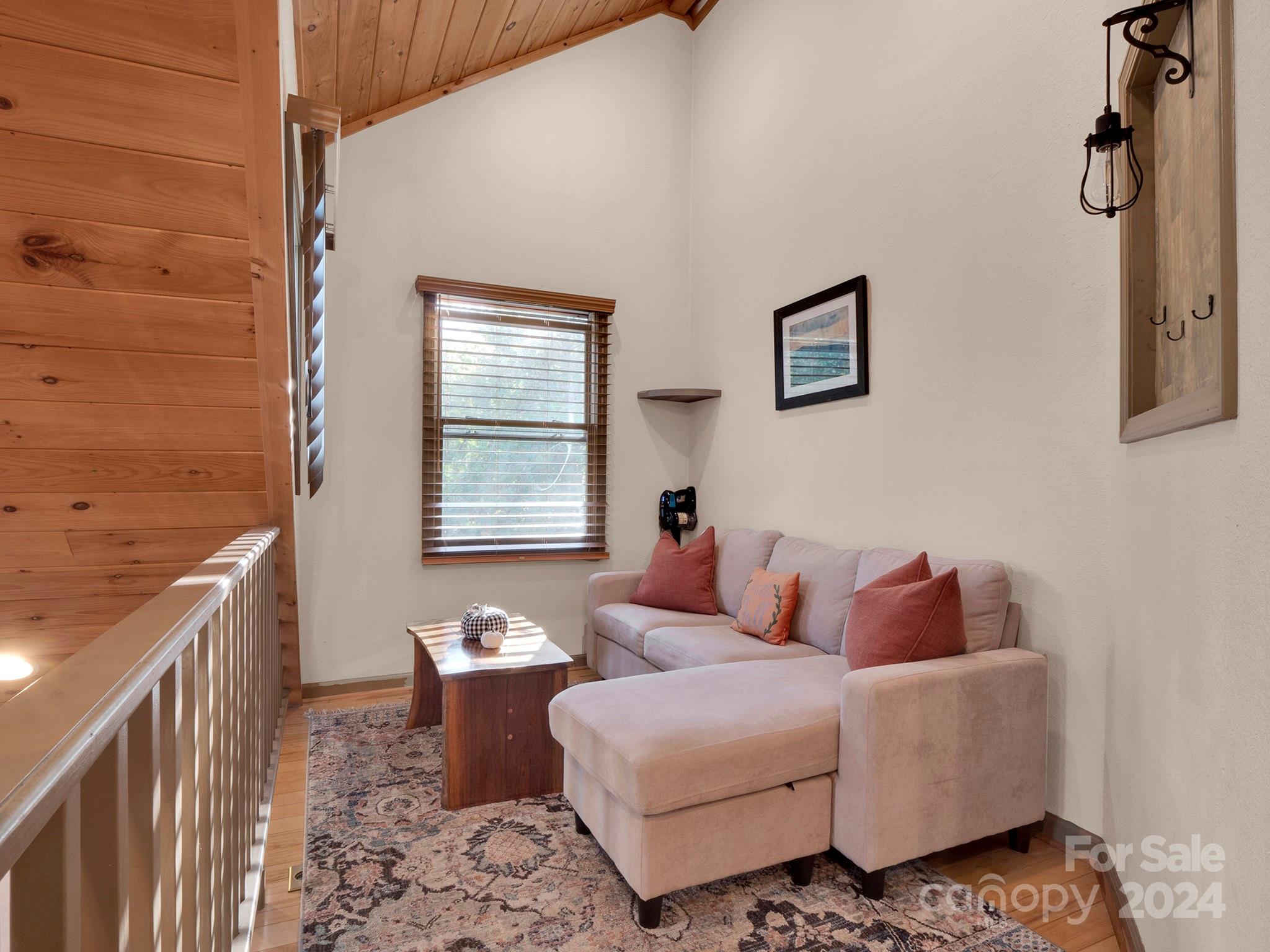 195 Grandview Mesa Road Whittier, NC 28789 - Photo 26 of 37 a living room with furniture and a window