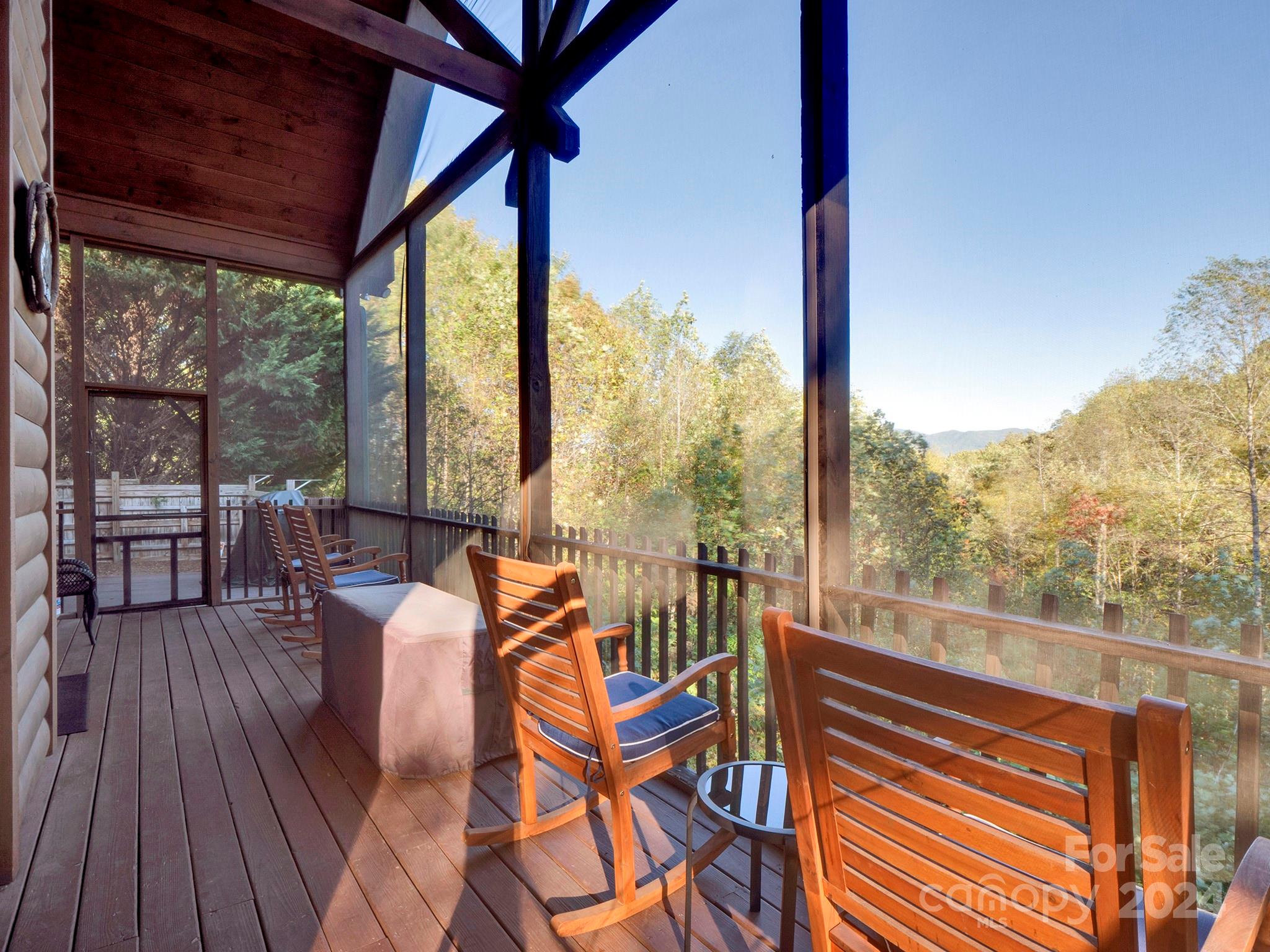 195 Grandview Mesa Road Whittier, NC 28789 - Photo 28 of 37 a view of a living room with furniture and wooden floor