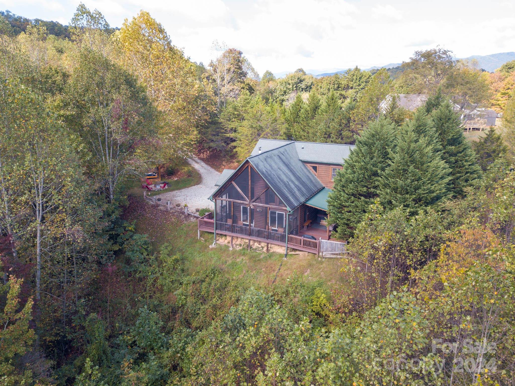 195 Grandview Mesa Road Whittier, NC 28789 - Photo 36 of 37 an aerial view of a house with a yard