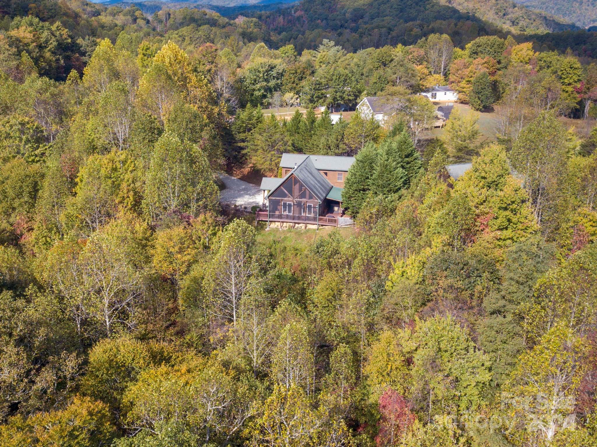 195 Grandview Mesa Road Whittier, NC 28789 - Photo 37 of 37 a view of residential houses with yard