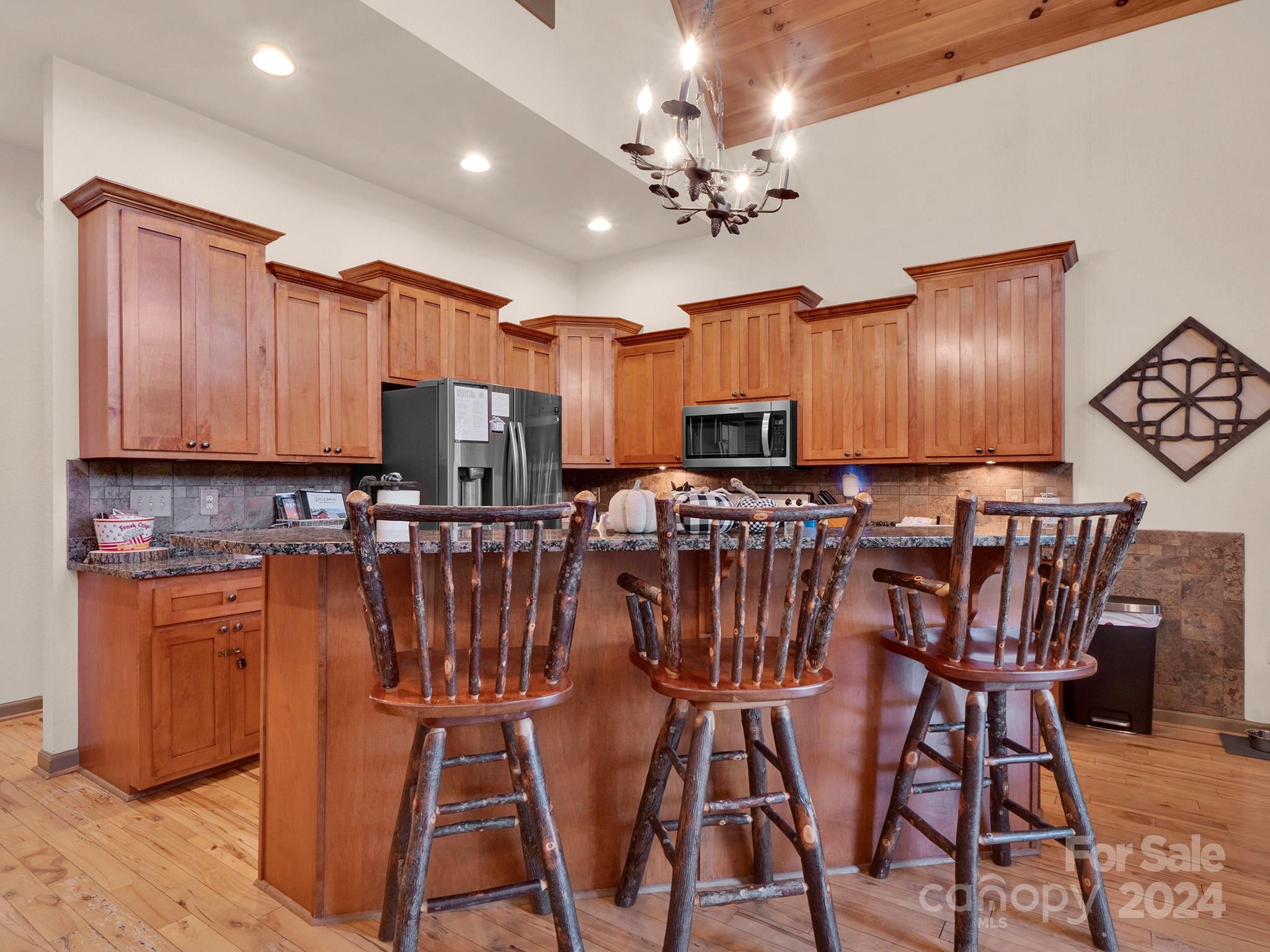 195 Grandview Mesa Road Whittier, NC 28789 - Photo 6 of 37 a view of a dining room with furniture