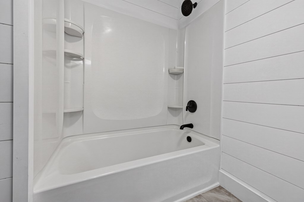 975 Goss Road Epworth, GA 30541 - Photo 58 of 58 a bathroom with a tub