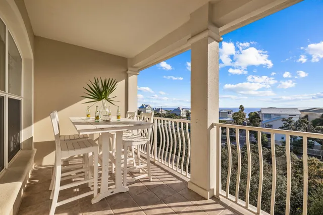 a view of balcony with furniture