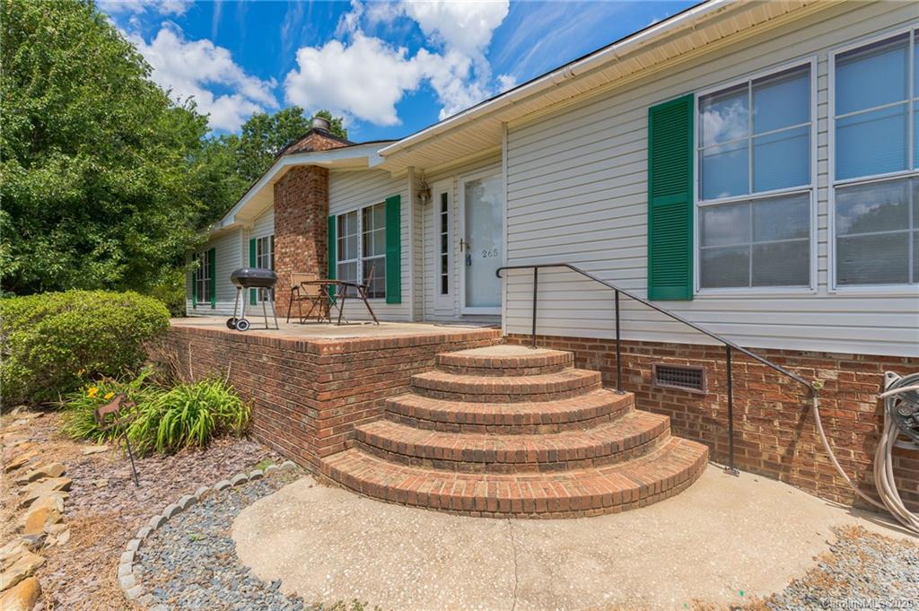 265 Pinecone Road Peachland, NC 28133 - Photo 2 of 35 a front view of a house with a yard