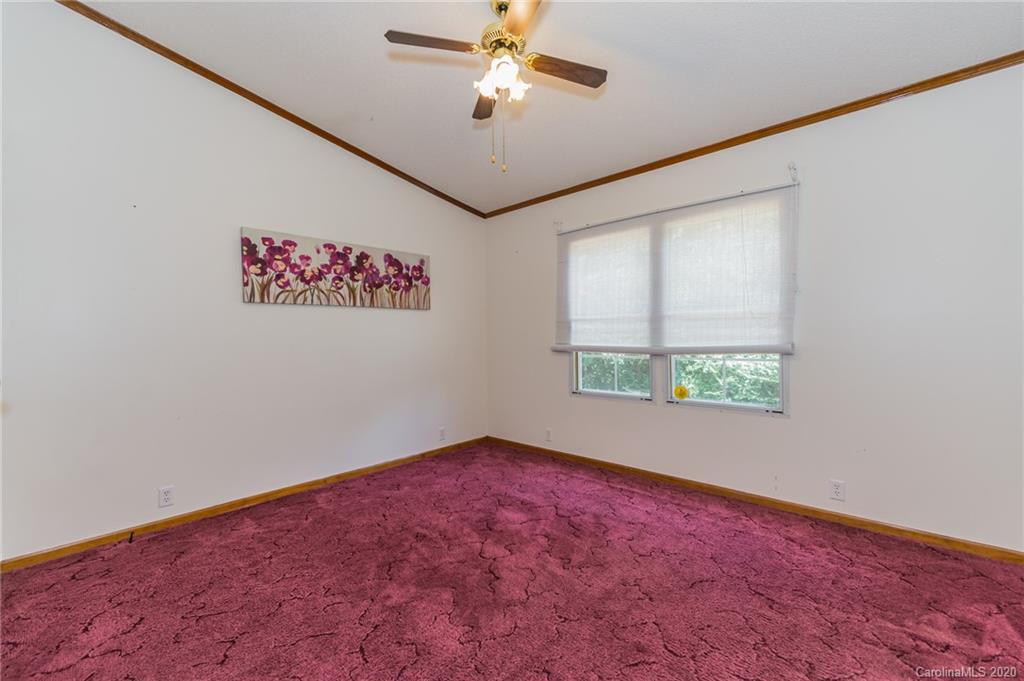 265 Pinecone Road Peachland, NC 28133 - Photo 17 of 35 an empty room with windows and fan