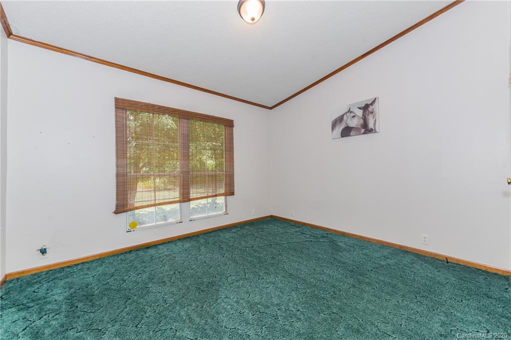265 Pinecone Road Peachland, NC 28133 - Photo 20 of 35 a view of an empty room with a window
