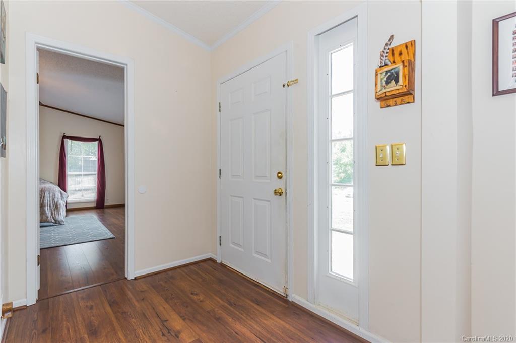 265 Pinecone Road Peachland, NC 28133 - Photo 3 of 35 a view of an entryway with wooden floor