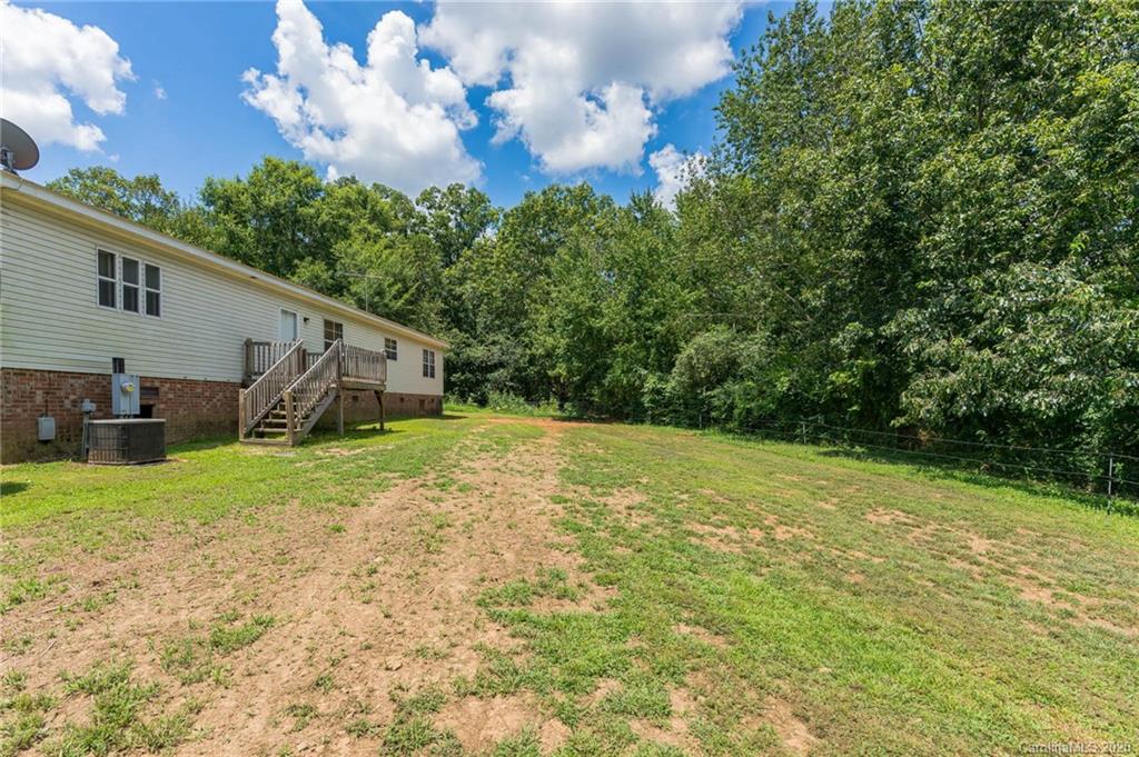 265 Pinecone Road Peachland, NC 28133 - Photo 22 of 35 a view of a house with a yard