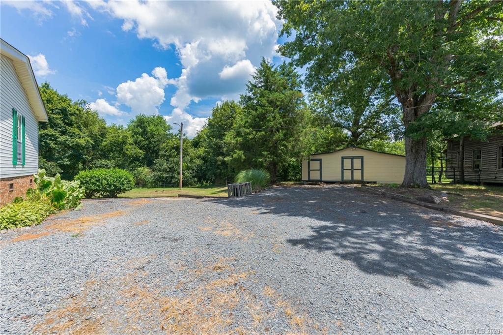 265 Pinecone Road Peachland, NC 28133 - Photo 25 of 35 a view of a house with backyard and trees
