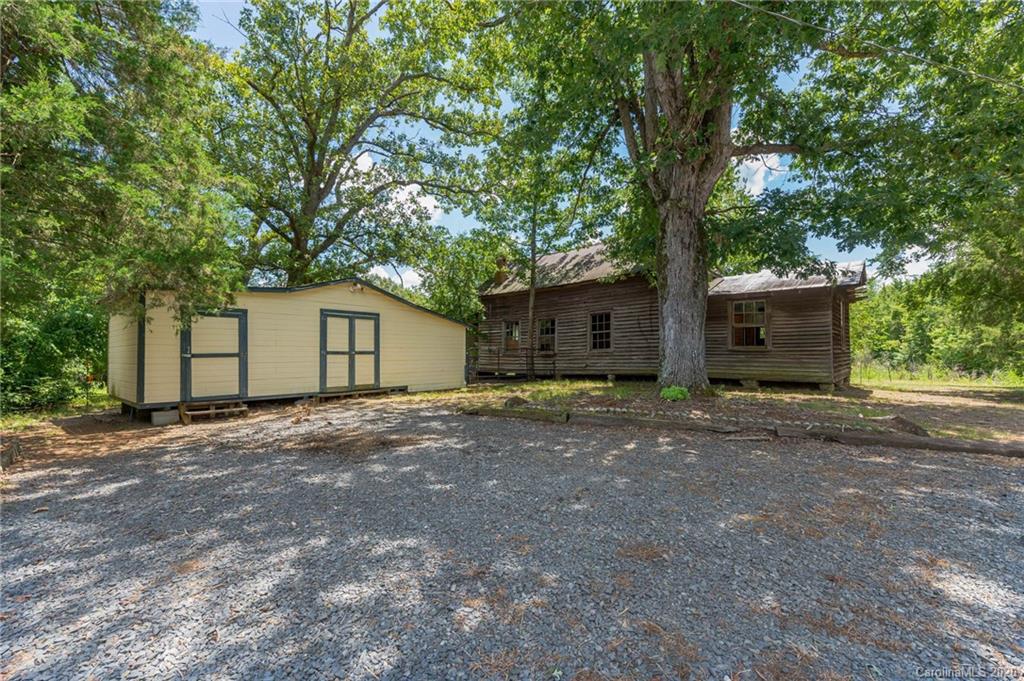 265 Pinecone Road Peachland, NC 28133 - Photo 26 of 35 a view of a house with a yard and garage