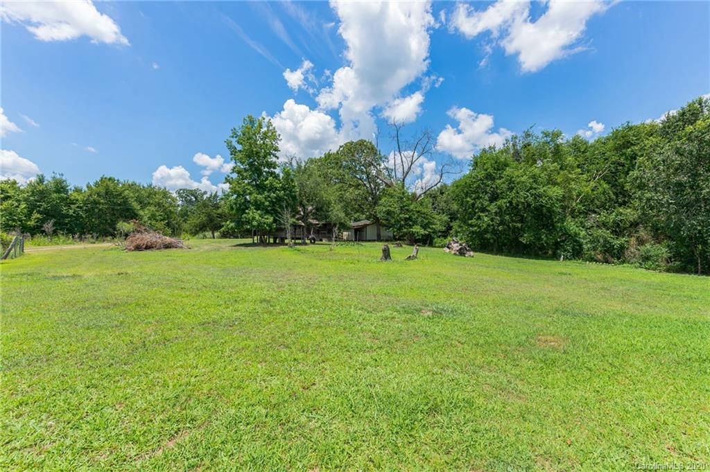 265 Pinecone Road Peachland, NC 28133 - Photo 29 of 35 a view of a green field with a tree