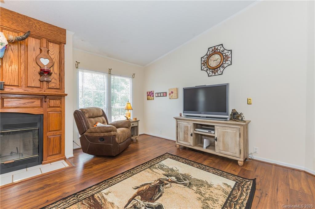 265 Pinecone Road Peachland, NC 28133 - Photo 6 of 35 a living room with furniture and a flat screen tv