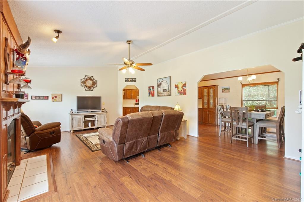 265 Pinecone Road Peachland, NC 28133 - Photo 7 of 35 a living room with furniture and a wooden floor