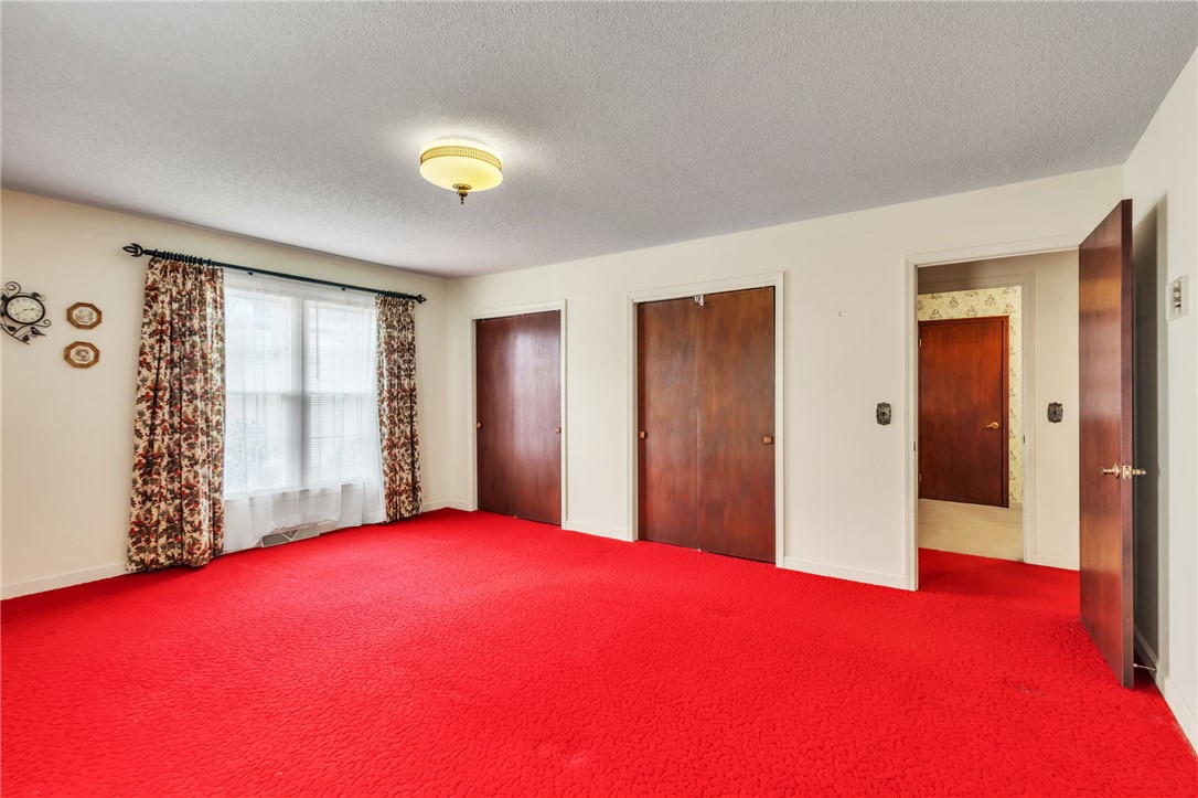 491 City Lake Road Pickens, SC 29671 - Photo 16 of 32 This inviting room features plush carpeting and multiple closets, creating a warm and functional living space.