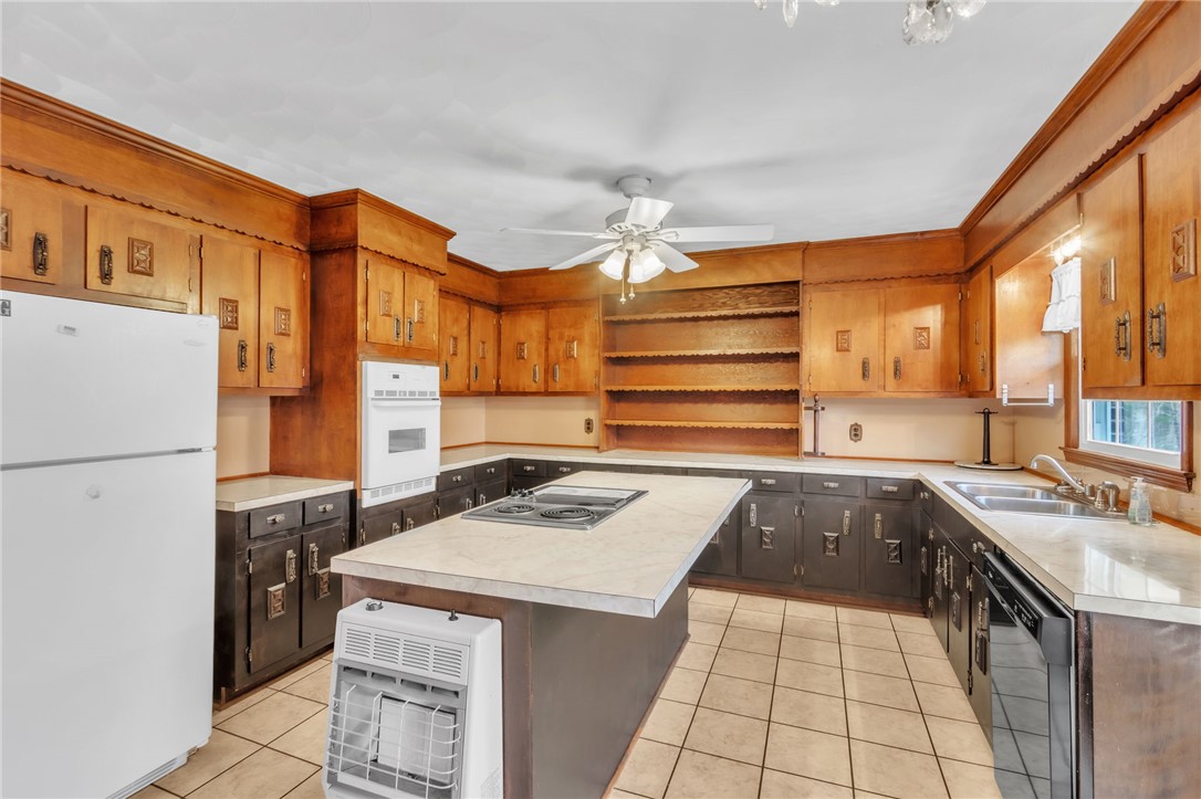 491 City Lake Road Pickens, SC 29671 - Photo 7 of 32 This spacious kitchen offers a functional layout with ample cabinet space.