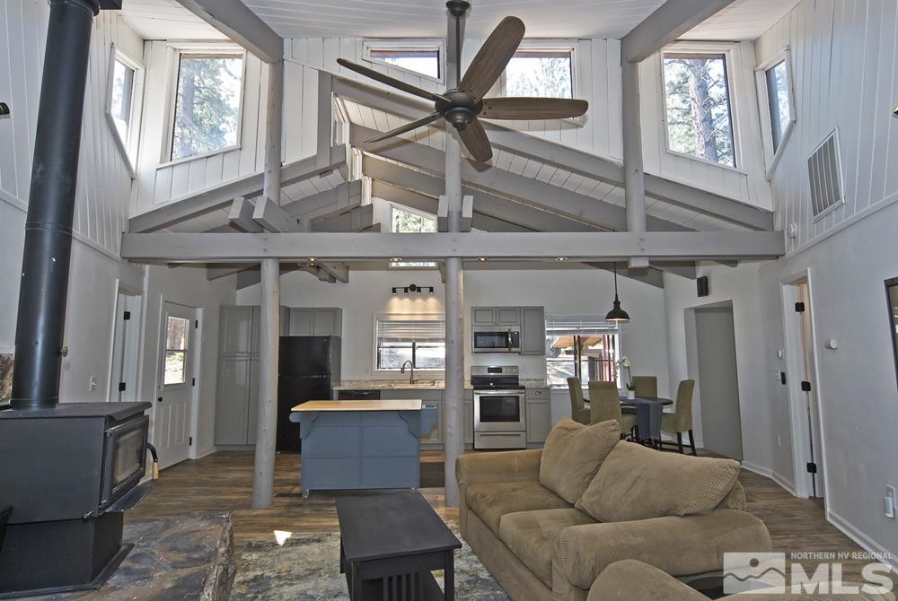 190 Pinon Road Markleeville, CA 96120 - Photo 12 of 31 a living room with furniture and a chandelier