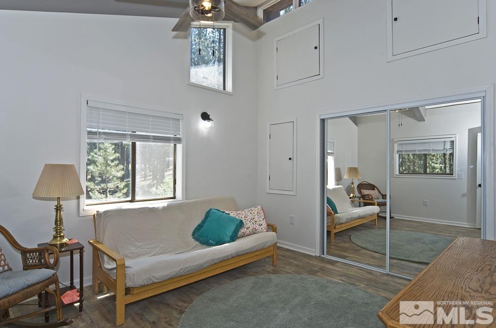 190 Pinon Road Markleeville, CA 96120 - Photo 14 of 31 a bedroom with furniture and a window