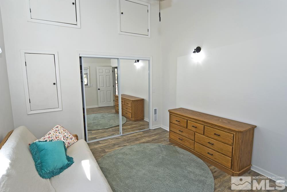 190 Pinon Road Markleeville, CA 96120 - Photo 15 of 31 a living room with furniture and a dresser