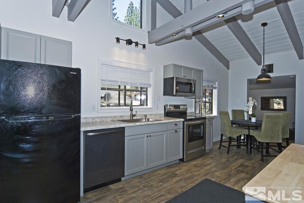 190 Pinon Road Markleeville, CA 96120 - Photo 8 of 31 a kitchen with sink stove and cabinets