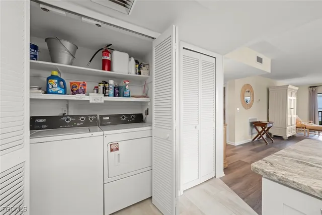 a view of dining room with baby cabinets