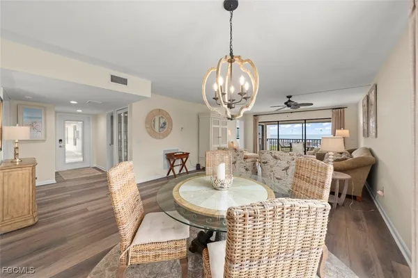 a view of a dining room with furniture