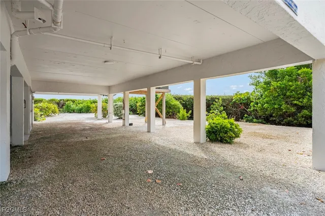 a view of a backyard and porch