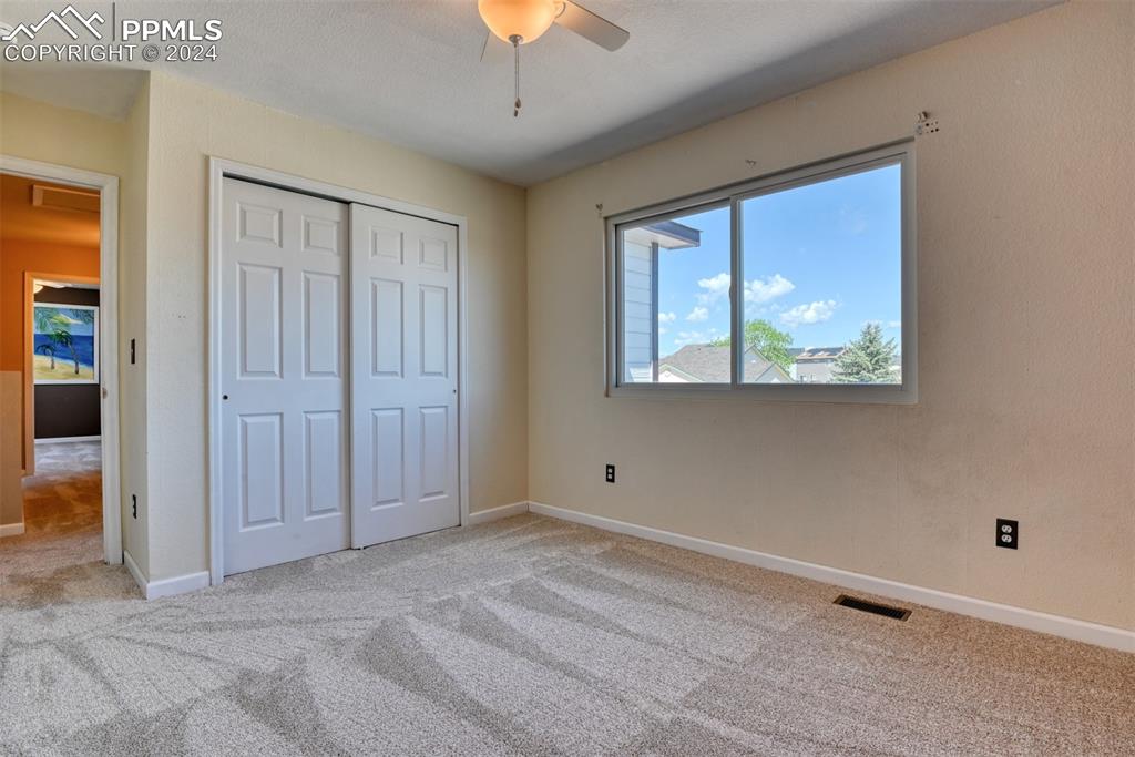 7863 Buschborn Road Peyton, CO 80831 - Photo 28 of 50 a view of an empty room with a window