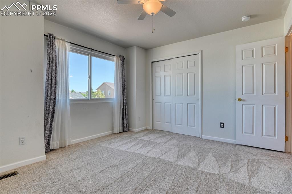 7863 Buschborn Road Peyton, CO 80831 - Photo 30 of 50 a view of an empty room with a window