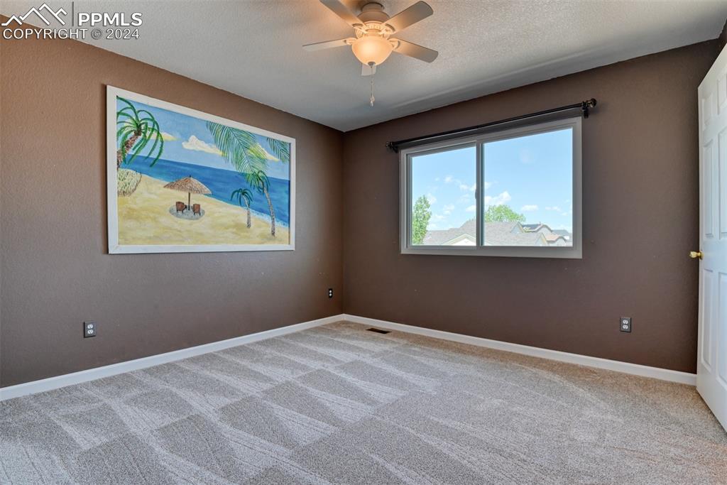 7863 Buschborn Road Peyton, CO 80831 - Photo 33 of 50 a view of an empty room with a window
