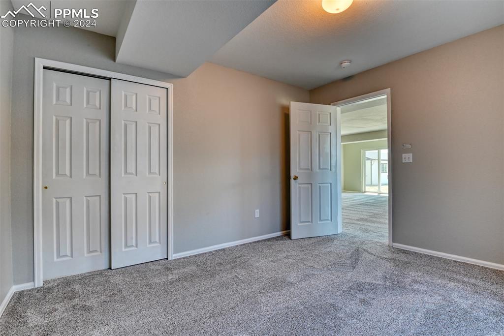 7863 Buschborn Road Peyton, CO 80831 - Photo 38 of 50 an empty room with windows and closet