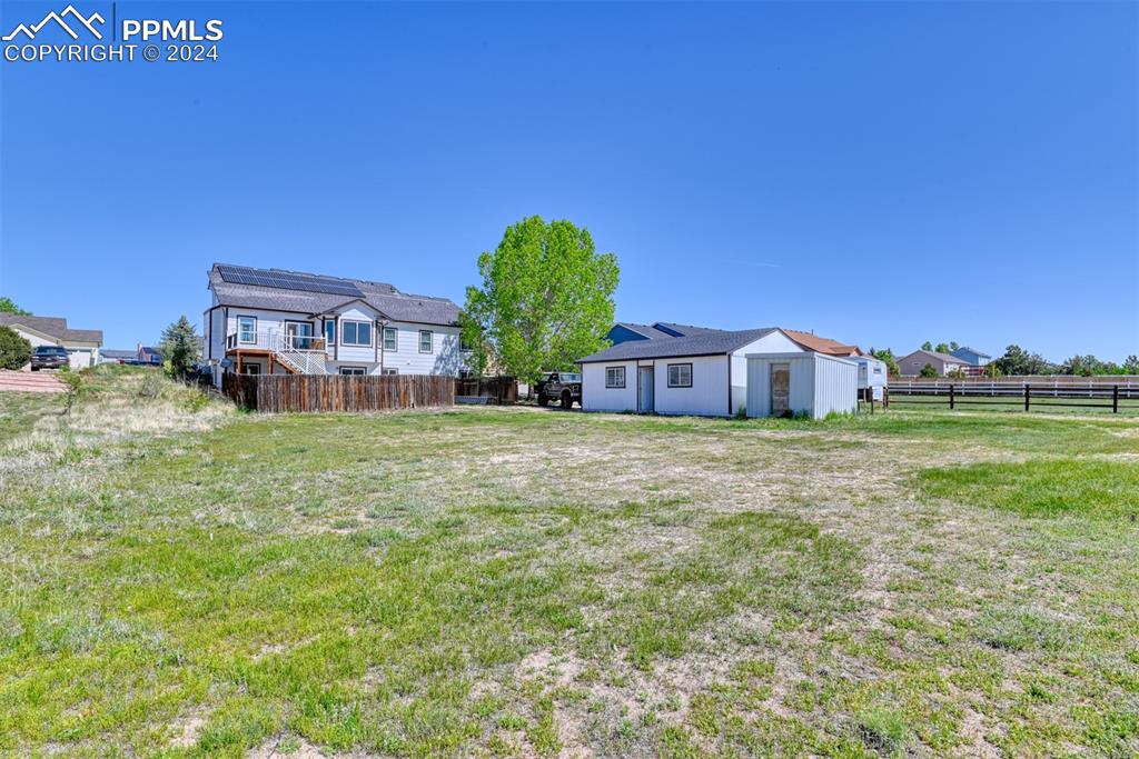 7863 Buschborn Road Peyton, CO 80831 - Photo 50 of 50 a house view with garden space