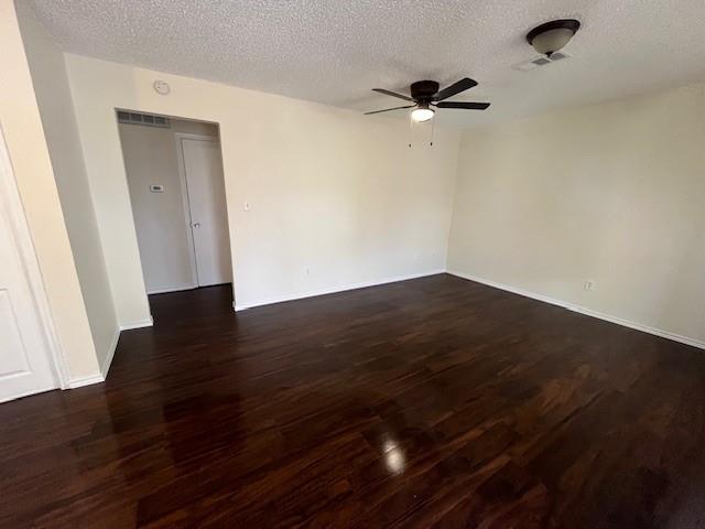 8127 Stonehurst Street, Unit 5 Dallas, TX 75217 - Photo 4 of 11 wooden floor in a empty room