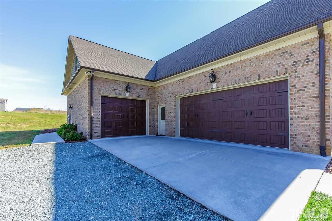 2514 Rogers Road Graham, NC 27253 - Photo 3 of 30 Both a single and double car garage provide EXPANSIVE room in the garage
