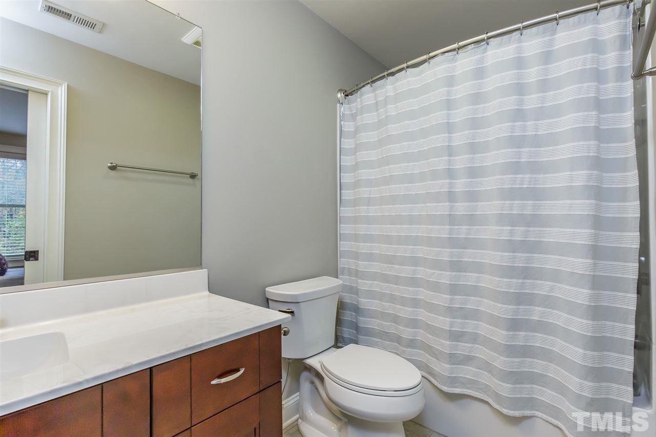 2514 Rogers Road Graham, NC 27253 - Photo 23 of 30 In-suite bath with tile flooring and shower/tub combination