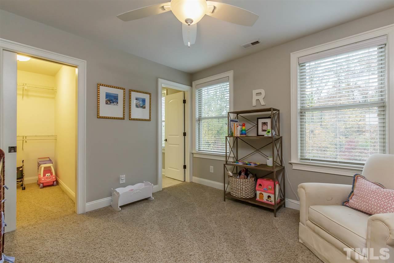 2514 Rogers Road Graham, NC 27253 - Photo 24 of 30 Walk-in closet, fan, carpet and in-suite bath in 11.11' x 11.10' Bedroom 4