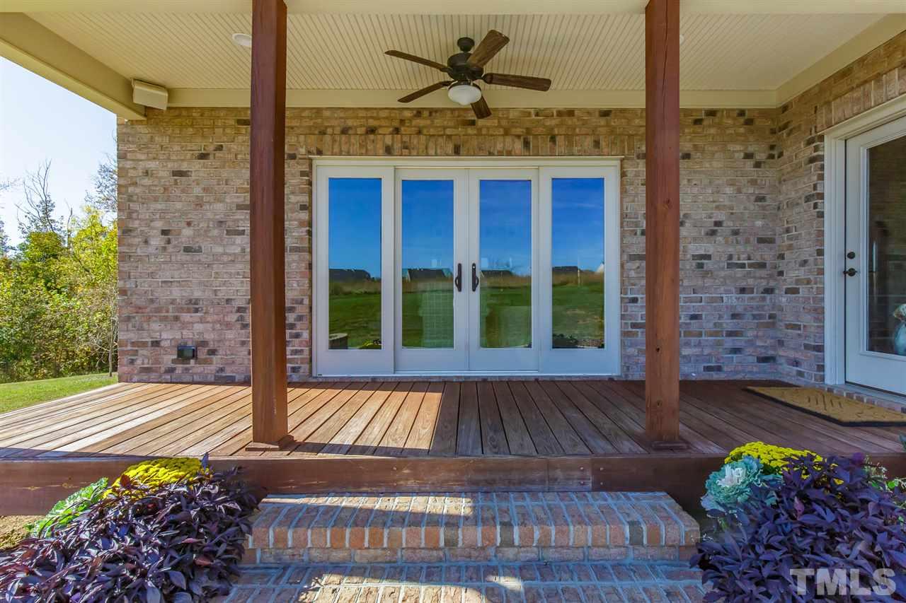2514 Rogers Road Graham, NC 27253 - Photo 27 of 30 Covered beadboard deck provides access to breakfast and family room