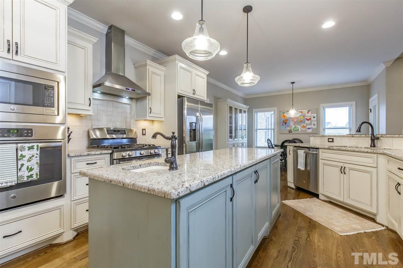 2514 Rogers Road Graham, NC 27253 - Photo 10 of 30 Stainless steel appliances including gas range and vent hood
